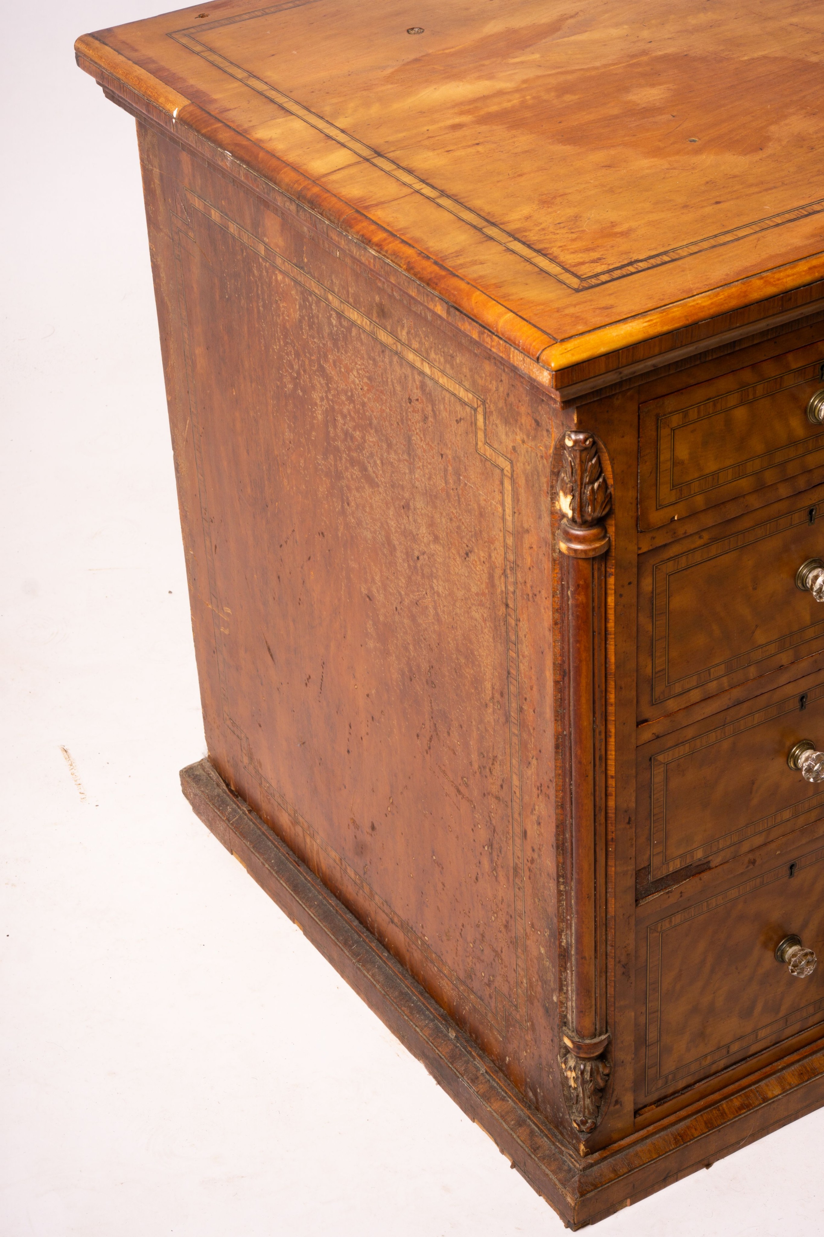 A late Victorian banded satinwood kneehole desk, width 138cm, depth 67cm, height 71cm